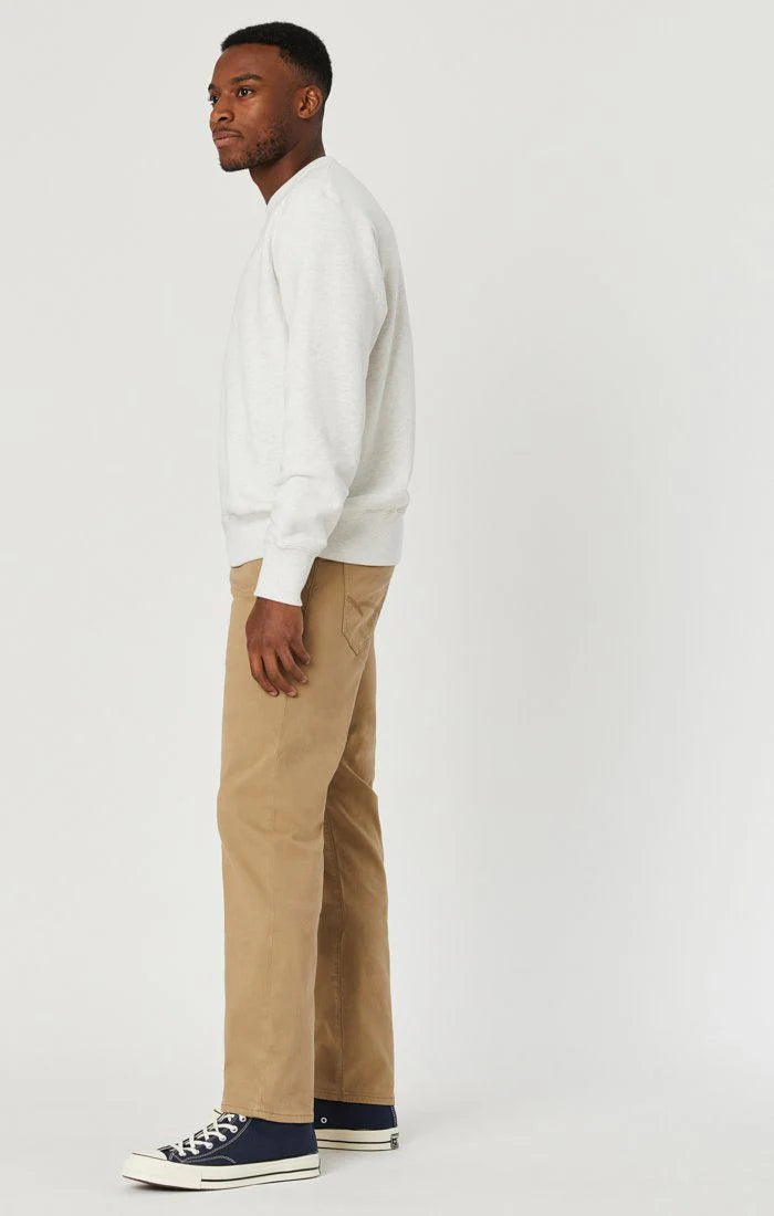 Straight leg Mavi Zach jeans in British khaki twill, offering a comfortable and modern fit for versatile styling.