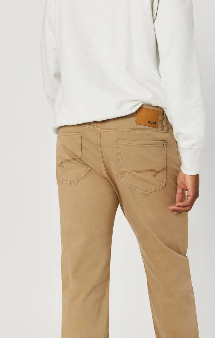Straight leg British khaki pants featuring two back pockets and visible stitching details, perfect for a modern wardrobe staple.