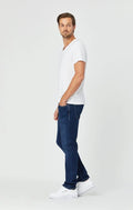 Relaxed straight leg jeans in dark wash with subtle whiskering, offering a comfortable fit and stylish silhouette.