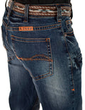 Bootcut jeans in medium wash with whiskering, fading, and patterned waistband from B. Tuff Jeans.