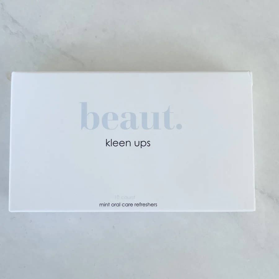 Kleen Ups Mint Oral Care Refreshers in a minimalistic white box, perfect for freshening breath on the go.