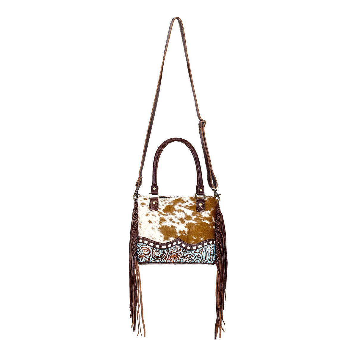 Chic brown hairon leather concealed carry bag with fringe detailing and adaptable straps for versatile carrying options.