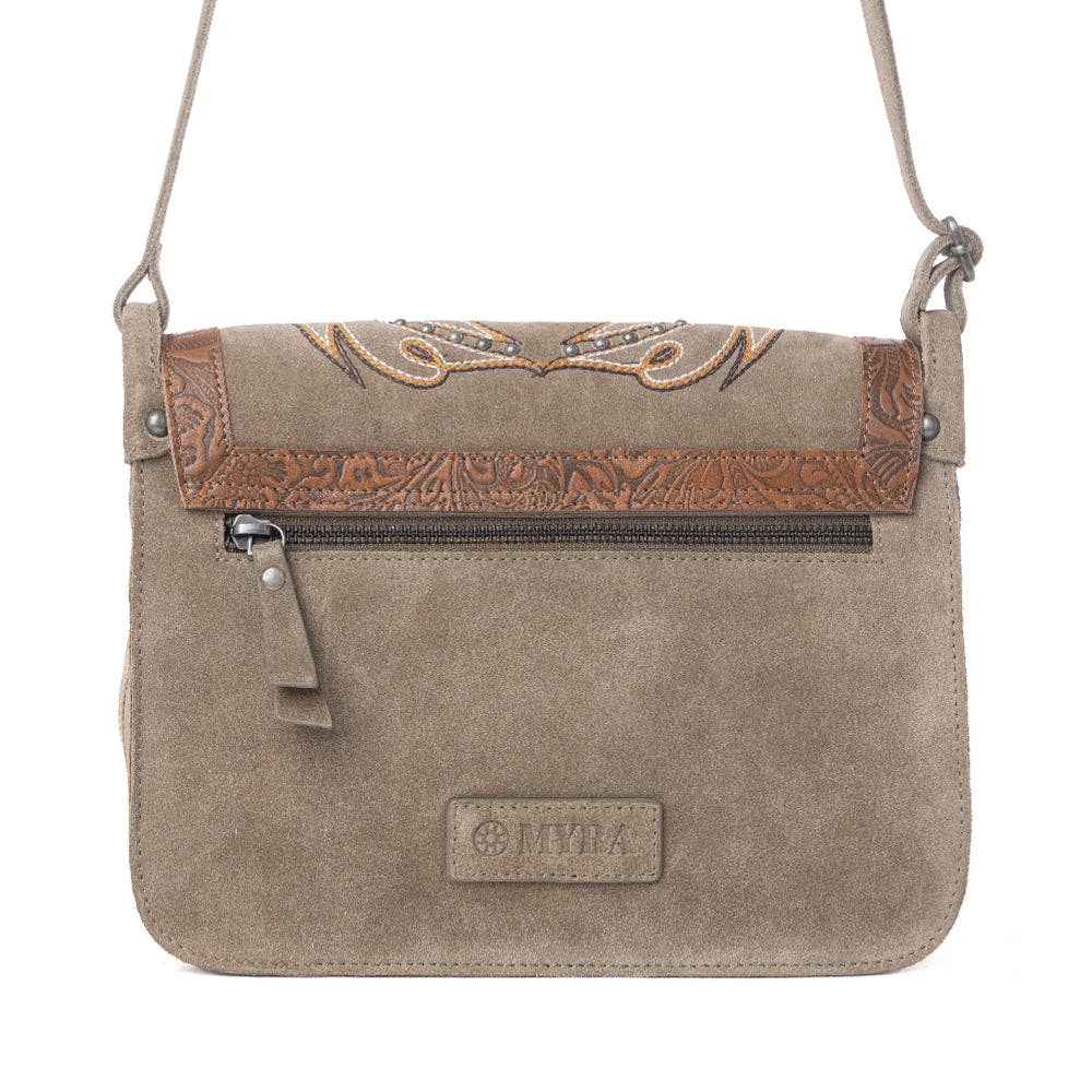 Soft suede olive taupe bag with western embroidery and embossed detailing, featuring a flap closure and shoulder strap.