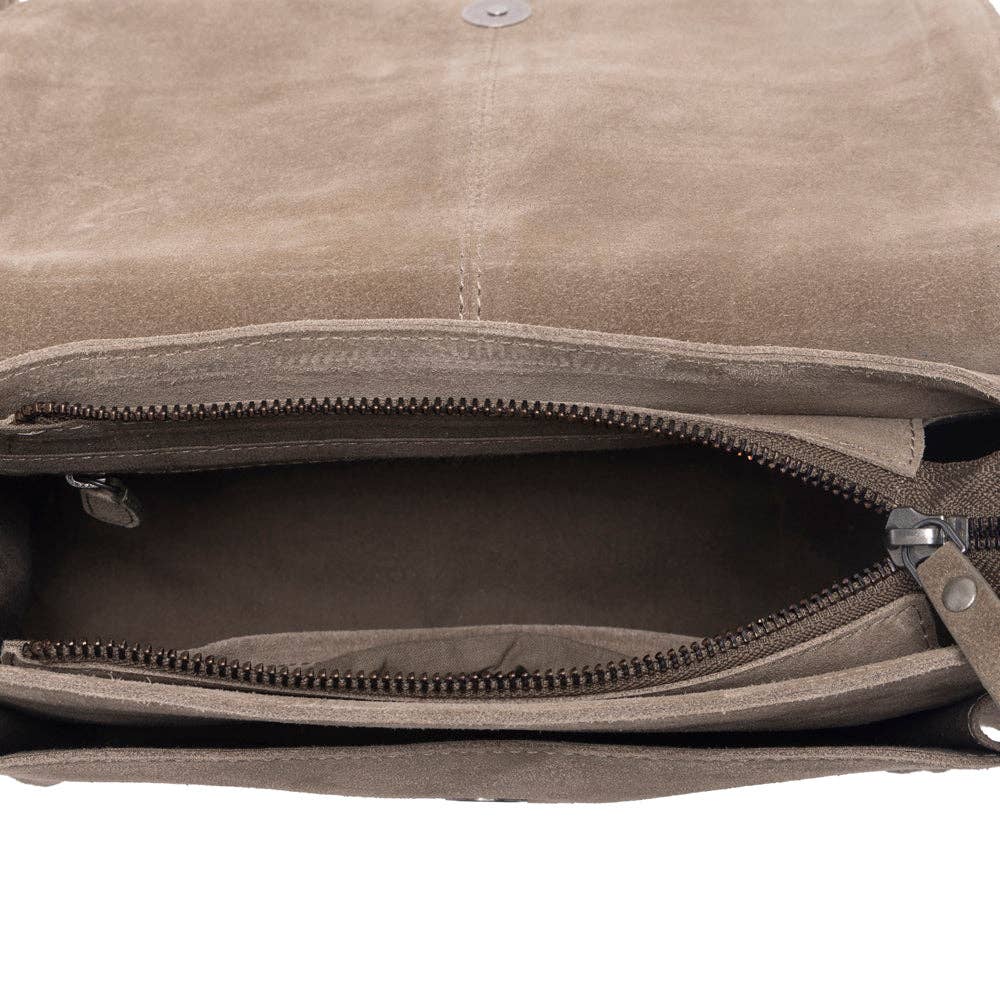 Olive taupe suede bag with western embroidery, featuring a zippered closure and softly structured silhouette.