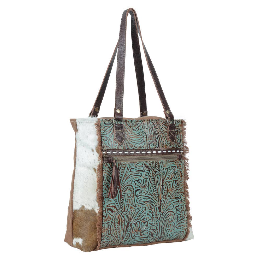 Amethyst Canvas & Hairon Pouch featuring a stylish patterned fabric and natural cowhide, perfect for storing small essentials.