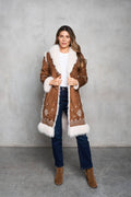 Faux suede camel coat with shearling trim and delicate embroidery on the front and back. Perfect for Western style.