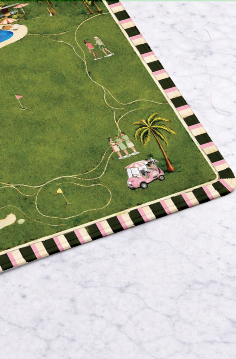 Green golf-themed mahjong mat featuring illustrations of a golf course, palm trees, and a pink golf cart.