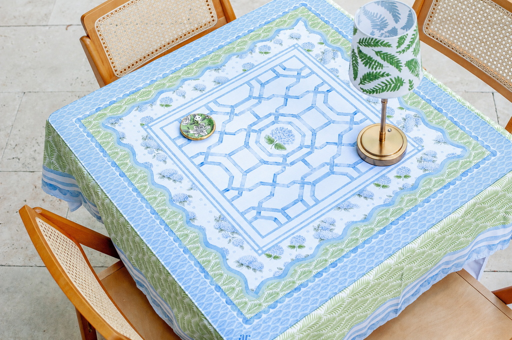 Floral Mahjong mat featuring soft blue florals and elegant lattice details with a scalloped edge.