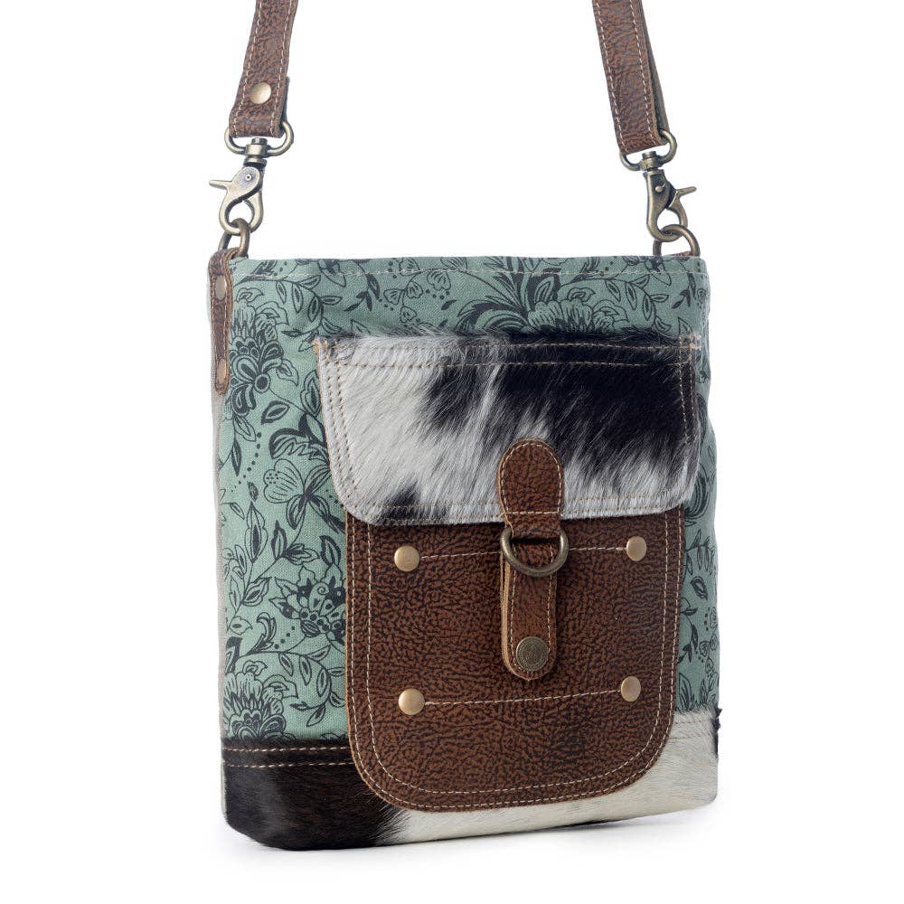Stylish Eau De Nil Shoulder Bag featuring a mix of green, brown, and black textures with a front pocket and shoulder strap.