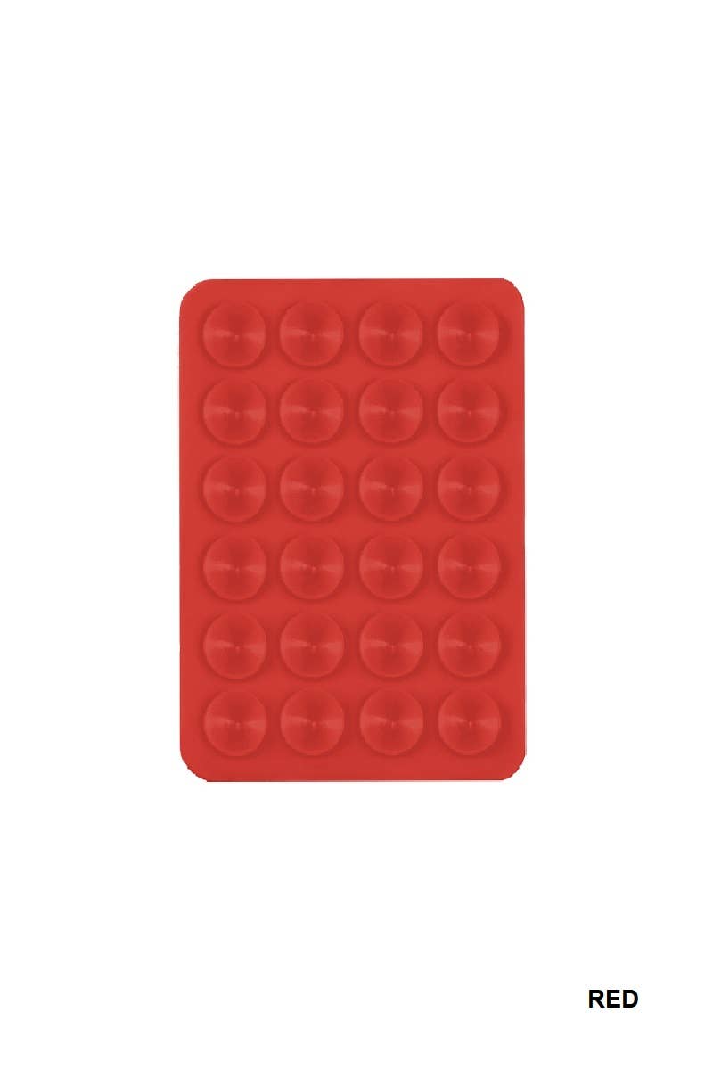 Red silicone suction cup phone holder with a grid design, perfect for hands-free selfies and videos.