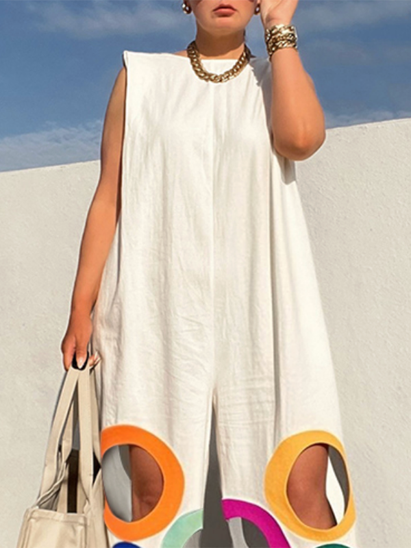 Sleeveless loose fit jumpsuit featuring a vibrant colorblock design with cutout details and convenient pockets.