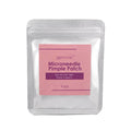 Silver pouch with a pink label featuring Microneedle Pimple Patch, highlighting 9 patches and the text 'Zap zits overnight'.