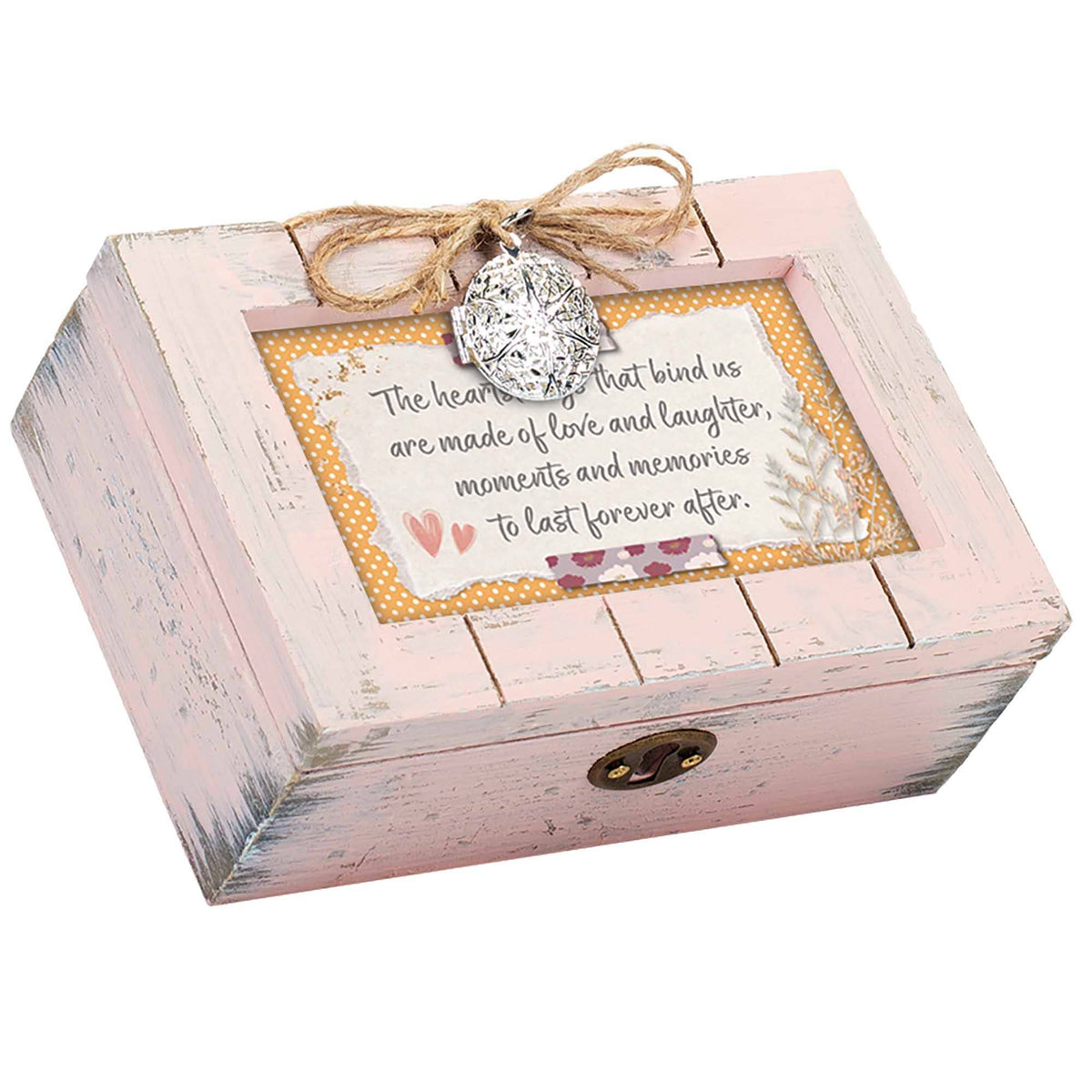 Wooden music box with rustic pink finish, heart locket, and art print about love and memories under glass.