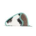 Turquoise-trimmed leather gun case with hand-tooled panel and black-and-white hairon, featuring a wrap-around zipper.