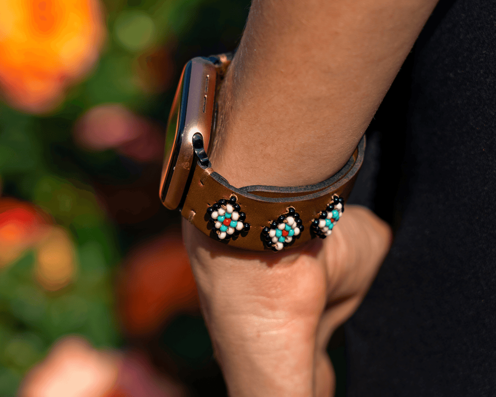 Leather band for Apple Watch featuring colorful beaded designs with a western flair. Perfect for daily wear.