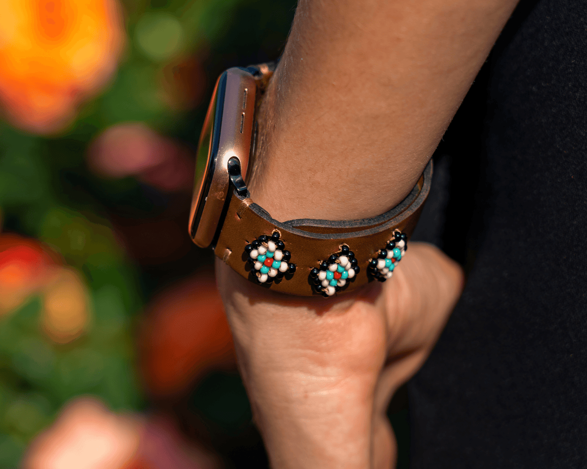 Leather band for Apple Watch featuring colorful beaded designs with a western flair. Perfect for daily wear.