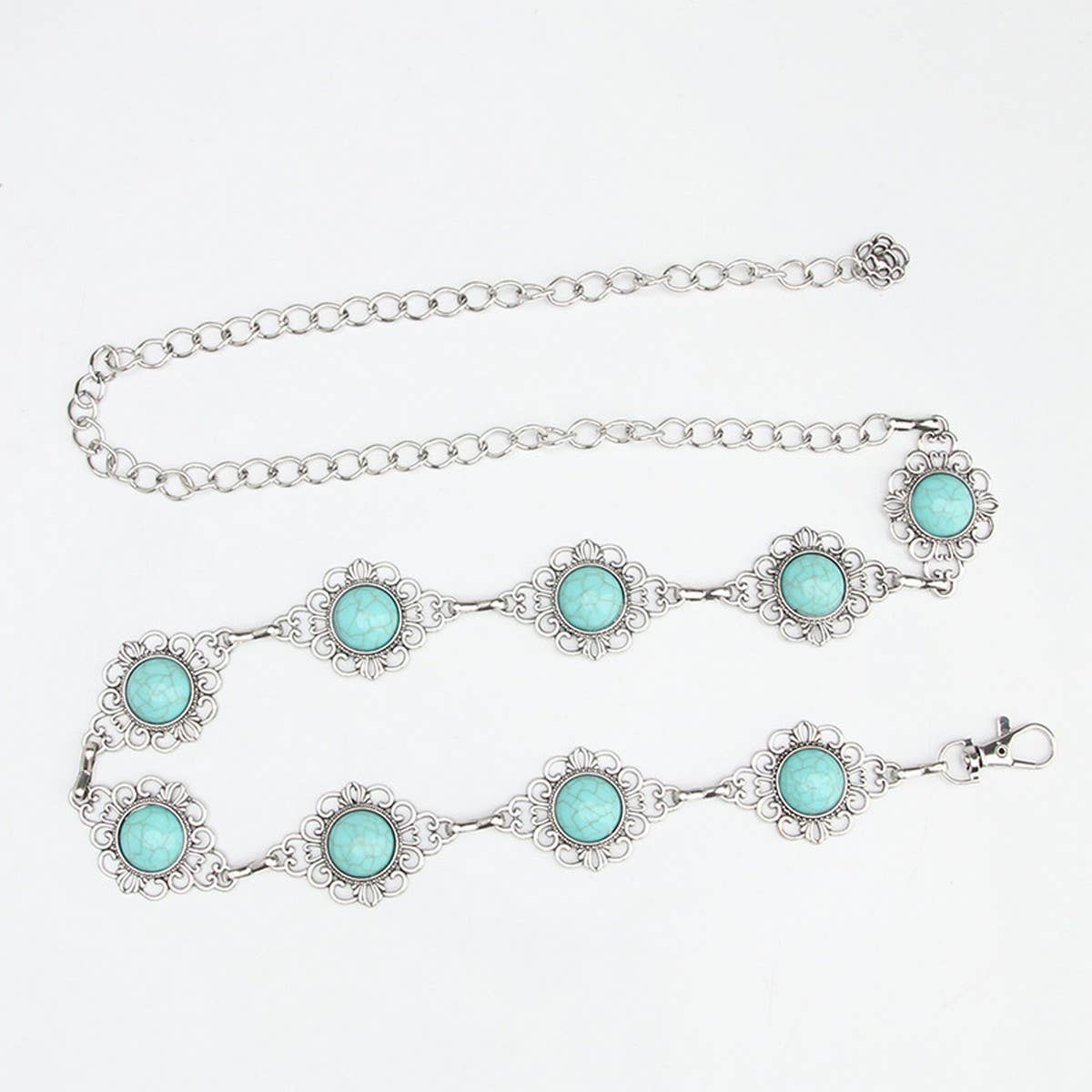 Waist chain belt featuring a vintage pattern with turquoise decorative elements in a silver-tone chain.