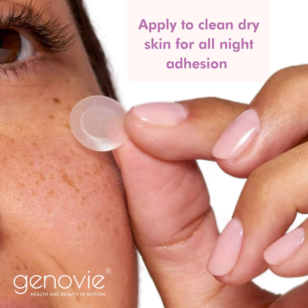 A person applying a transparent microneedle pimple patch to clean skin for fast healing.