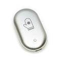 Hand warmer shaped like a mitten with a metallic silver finish and a button, designed for portability and convenience.
