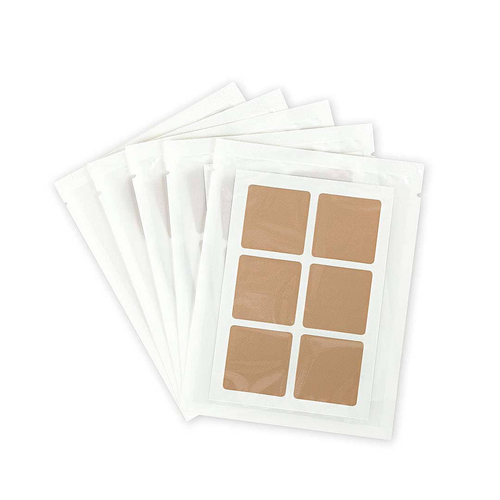 Multiple packs of beige Fit Patches, each containing six patches, displayed in a clear, sealed format.