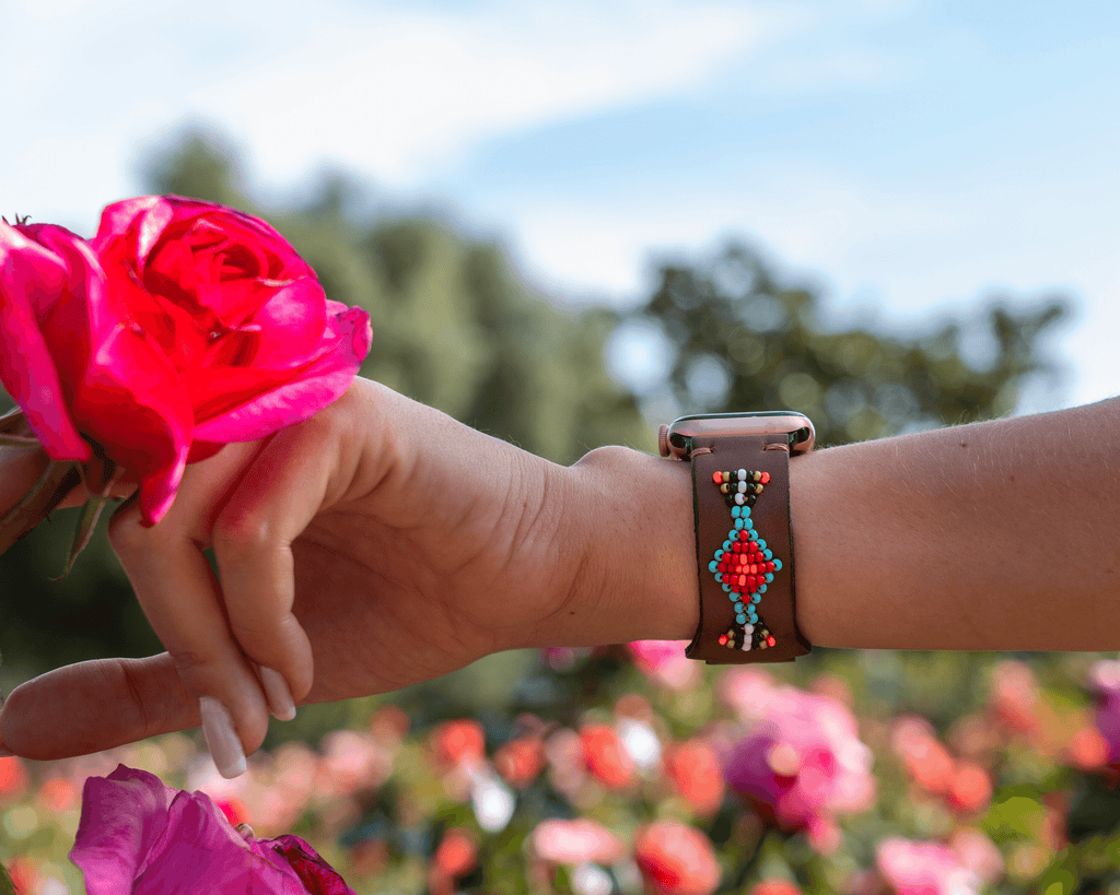 Colorful beaded design on a leather Apple Watch band, showcasing a western-inspired style perfect for everyday wear.