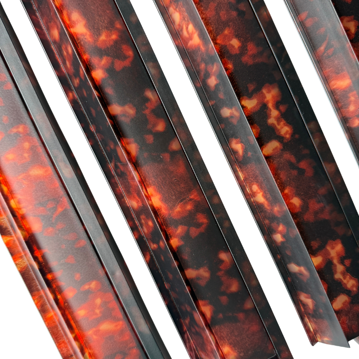Multiple tortoise shell Mahjong racks arranged to showcase their elegant design and vibrant colors.
