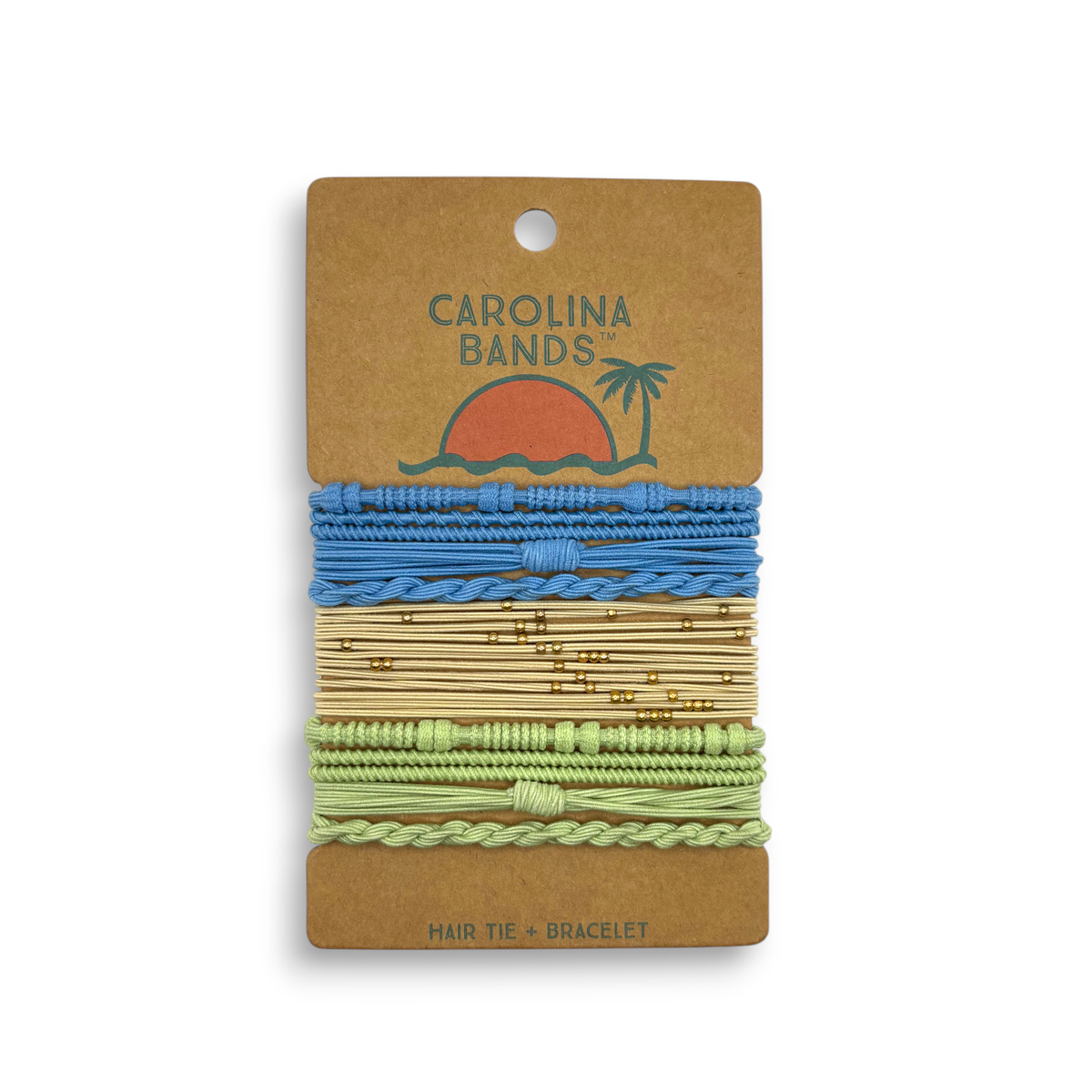 A set of Carolina Bands hair tie bracelets in blue, green, and neutral tones with gold accents, featuring a palm tree graphic.