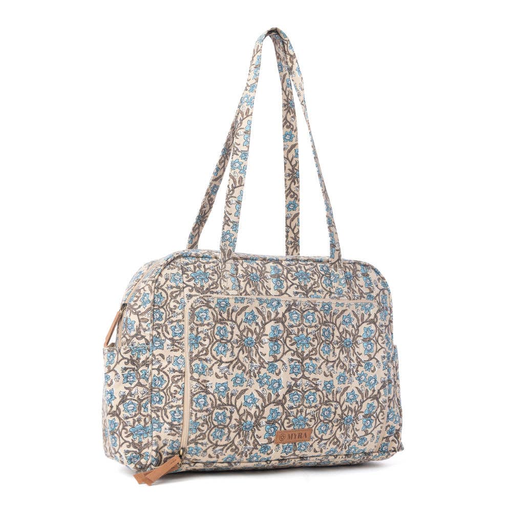 Vintage floral diaper bag in dusty teal with spacious main compartment and structured shape, featuring two shoulder straps and an inside zipper pocket.
