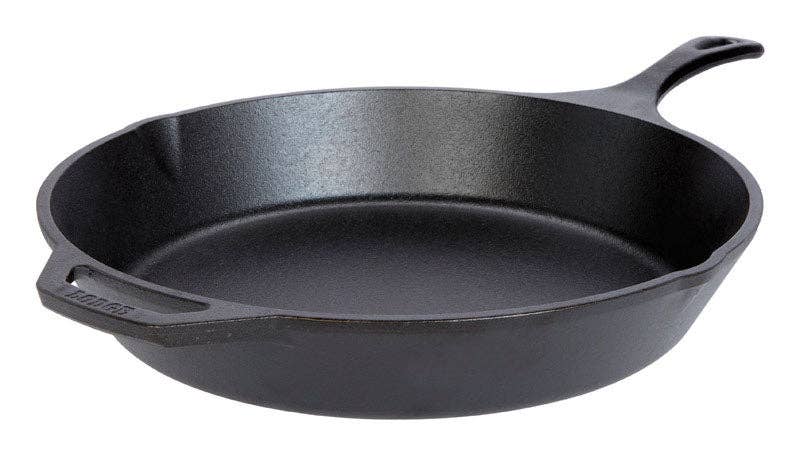 A smooth black cast iron skillet with a long handle, perfect for versatile cooking techniques.
