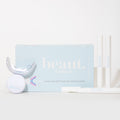 Mouthpiece and three whitening pens from the Cozy Kit for dental care and teeth whitening.