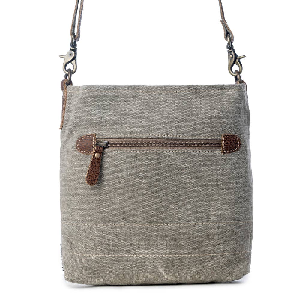 Stylish Eau De Nil Shoulder Bag featuring a front zip pocket and adjustable shoulder strap in a textured design.