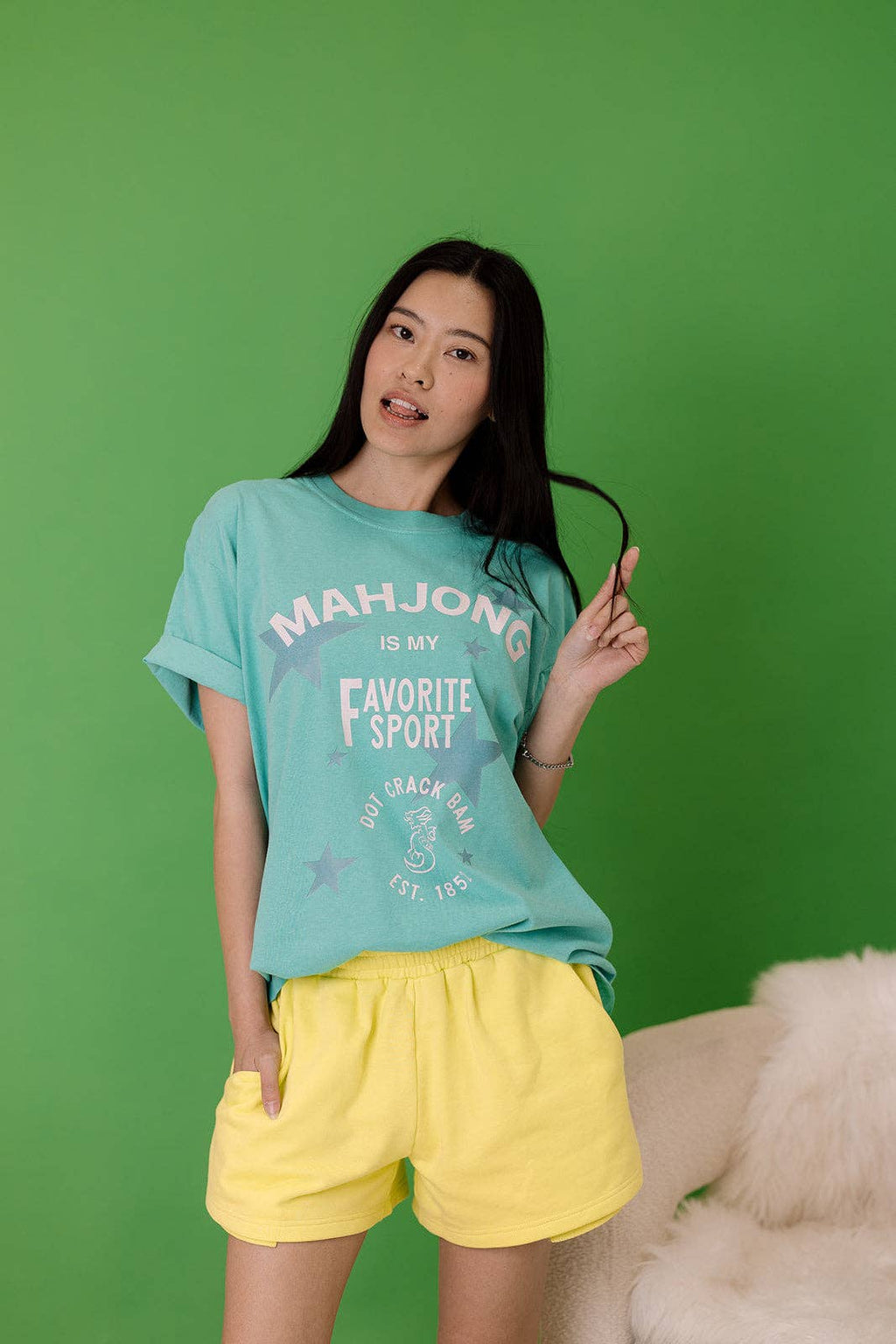 Light blue tee featuring the text 'MAHJONG IS MY Favorite Sport' in a relaxed fit, perfect for casual outings and game nights.