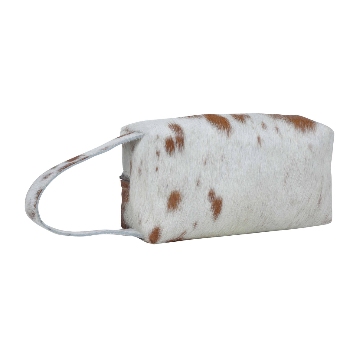 Rectangular pouch with a hair-on hide exterior, featuring a fringe zipper pull and a comfortable handle. Perfect for grooming essentials.