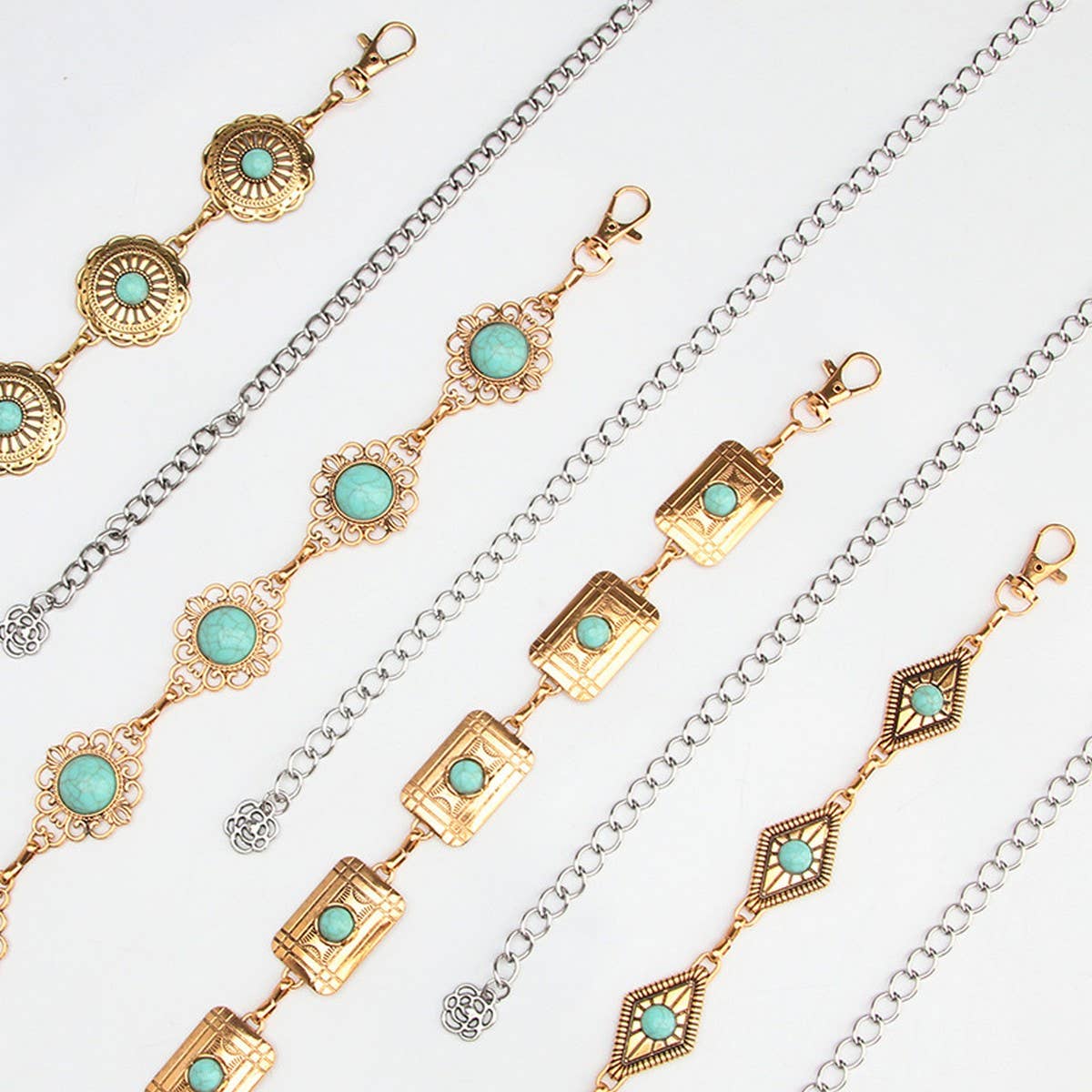 Multiple vintage pattern turquoise decor waist chain belts featuring various metal finishes and decorative clasps.