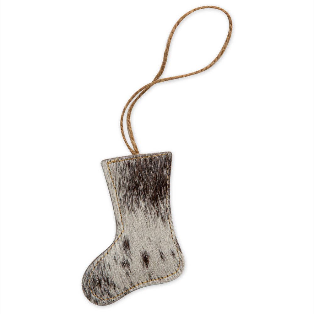Hair-on hide Christmas stocking ornament with stitched edges and jute hanger, showcasing a unique design.