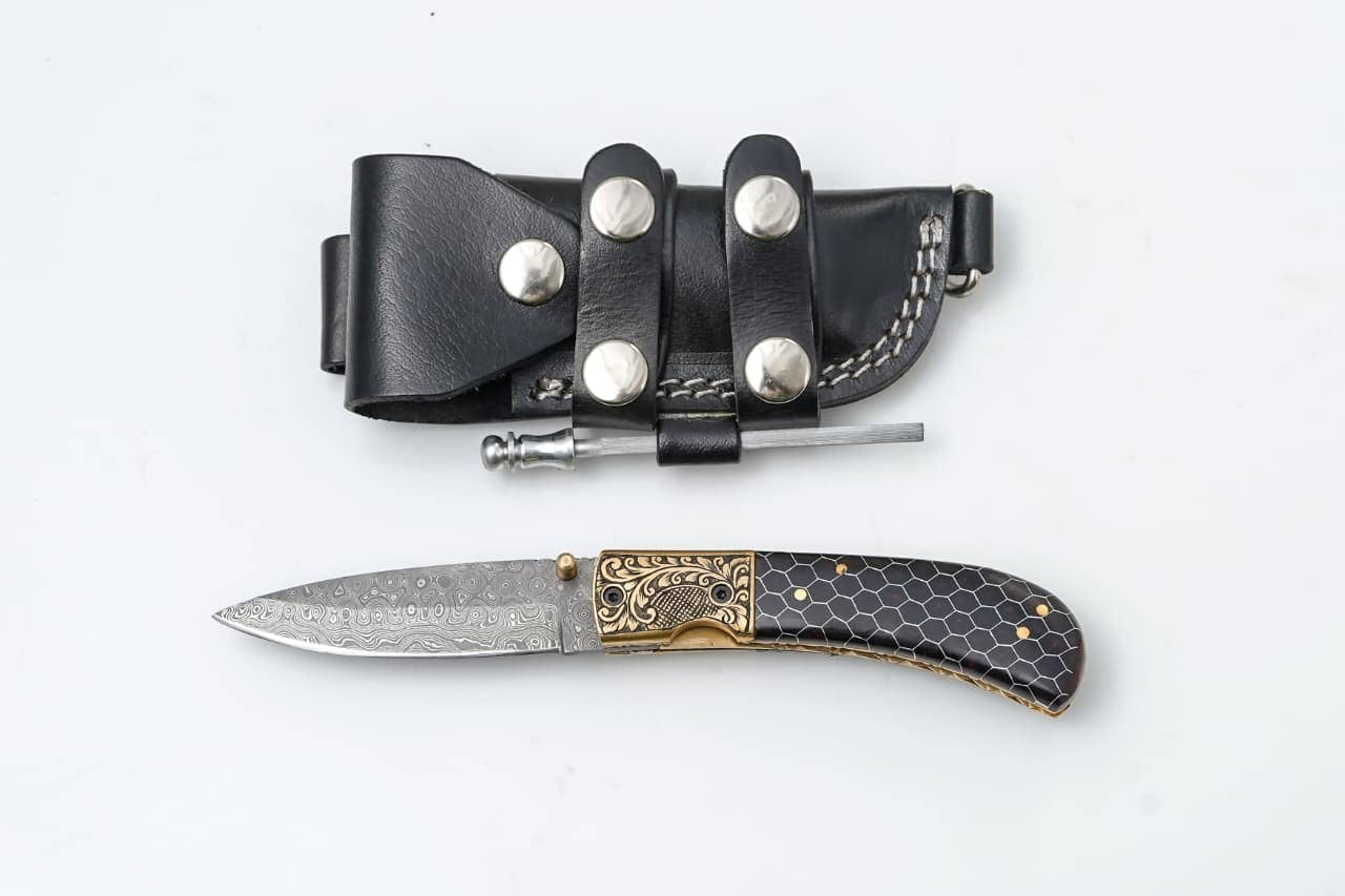 Titan International - Hand-Engraved Damascus Folding Knife with Honeycomb Handle