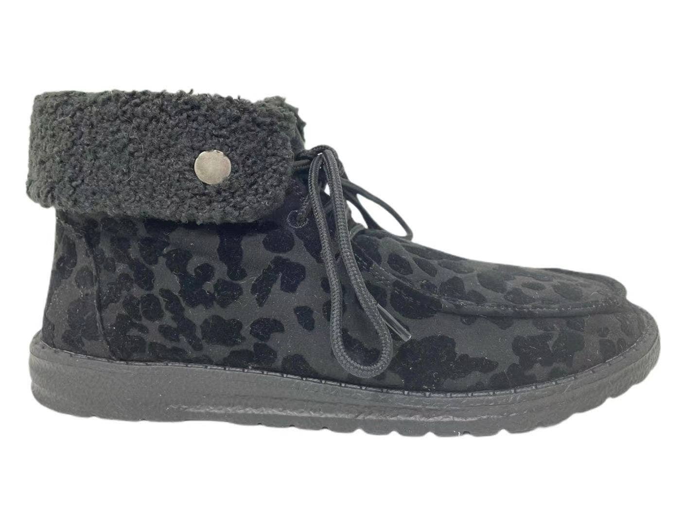 Black leopard print shoe with a low heel, high ankle design, fur-like cuff, and laces for fastening. Perfect for versatile styling.