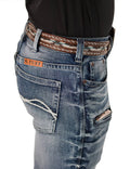 Bootcut B. Tuff Jeans in medium to light wash with side whiskering and decorative waistband.