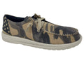 Slip-on shoe featuring a camouflage pattern with stars, designed for casual wear and comfort. Perfect for easy outings.