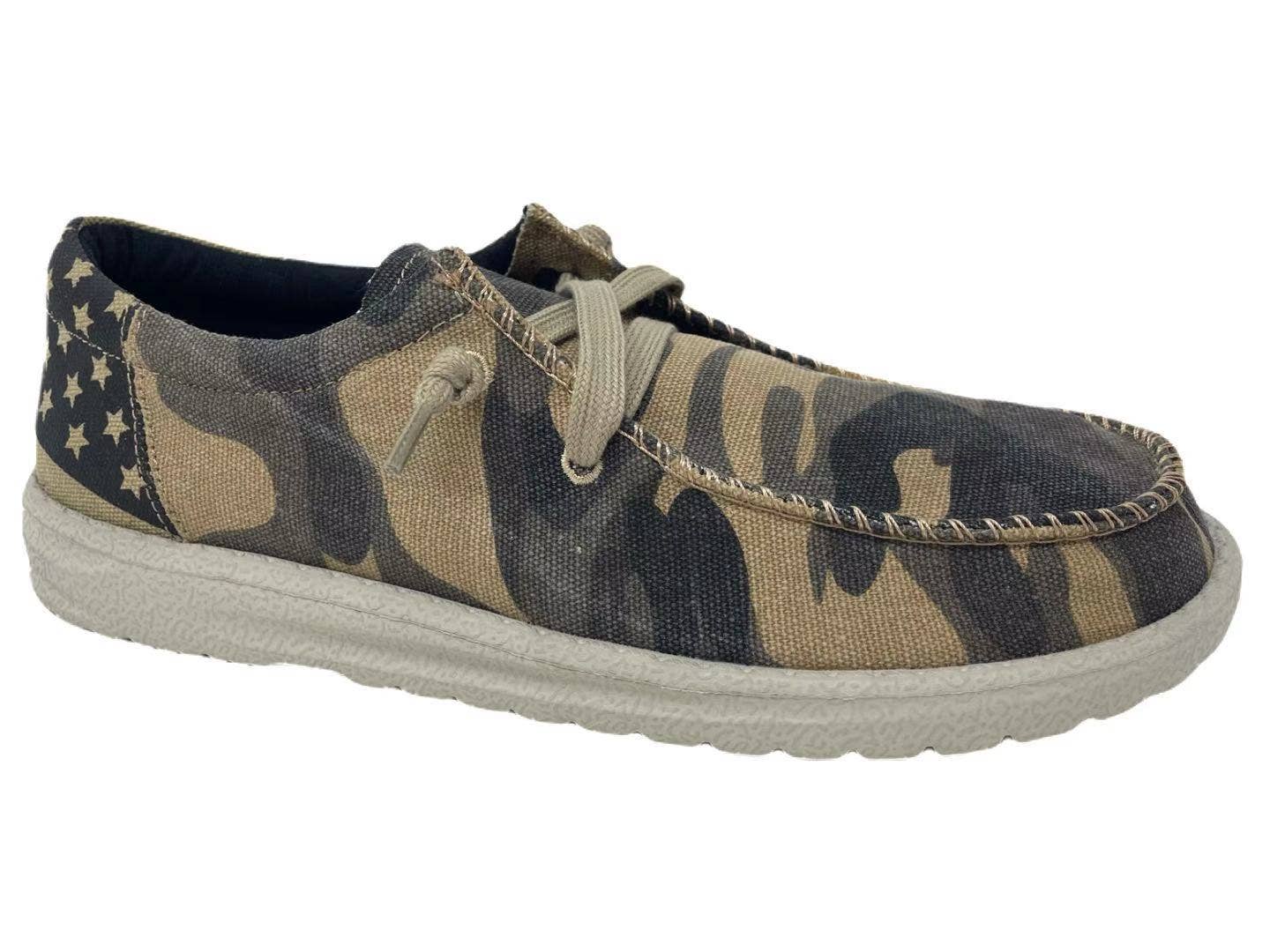 Slip-on shoe featuring a camouflage pattern with stars, designed for casual wear and comfort. Perfect for easy outings.