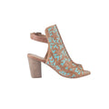 Floral-embossed tan and turquoise heel shoes with an open toe design and a chunky heel for comfort and stability.
