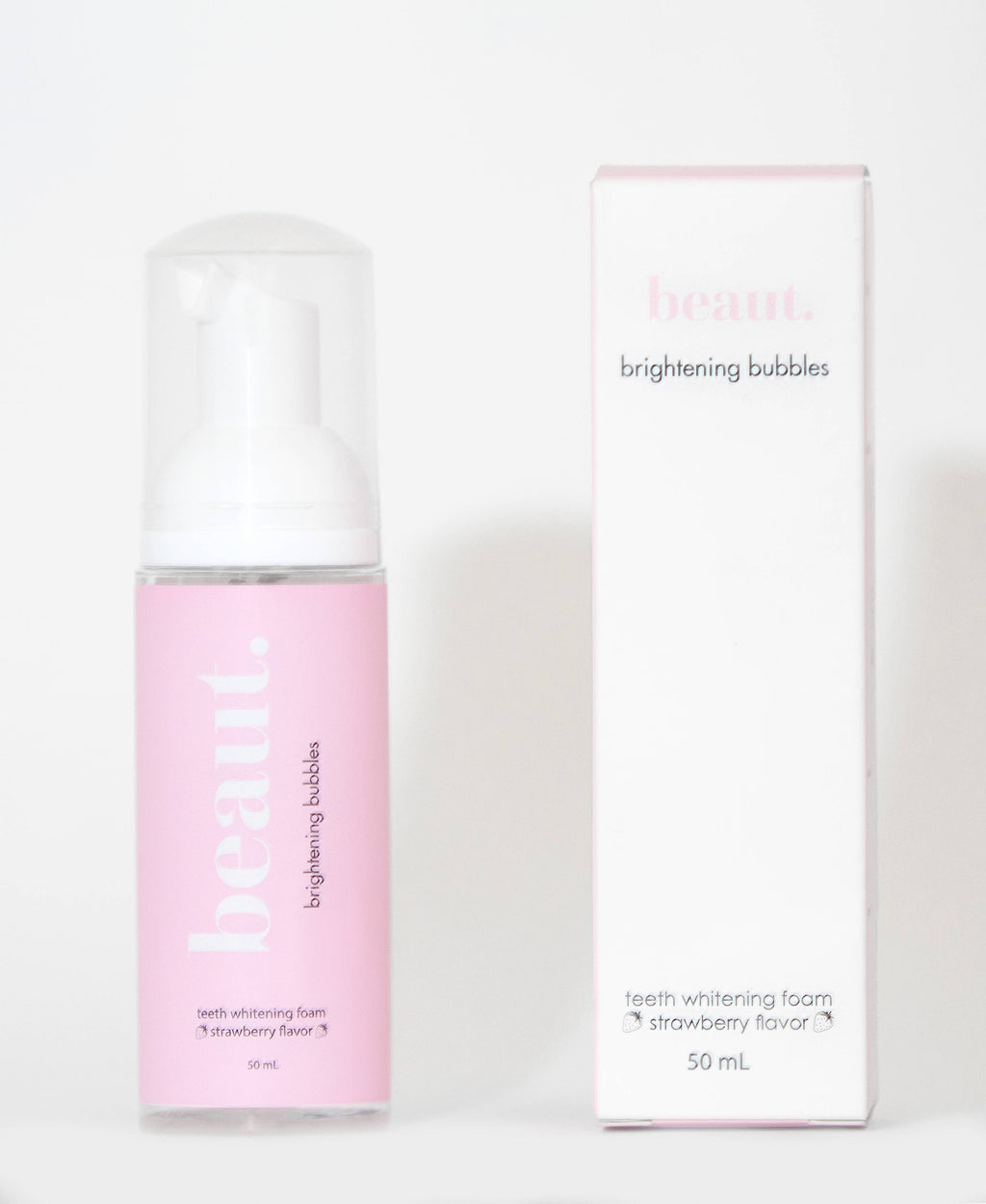 Brightening Bubbles in a pink pump dispenser, featuring strawberry flavor for teeth whitening and daily oral care.