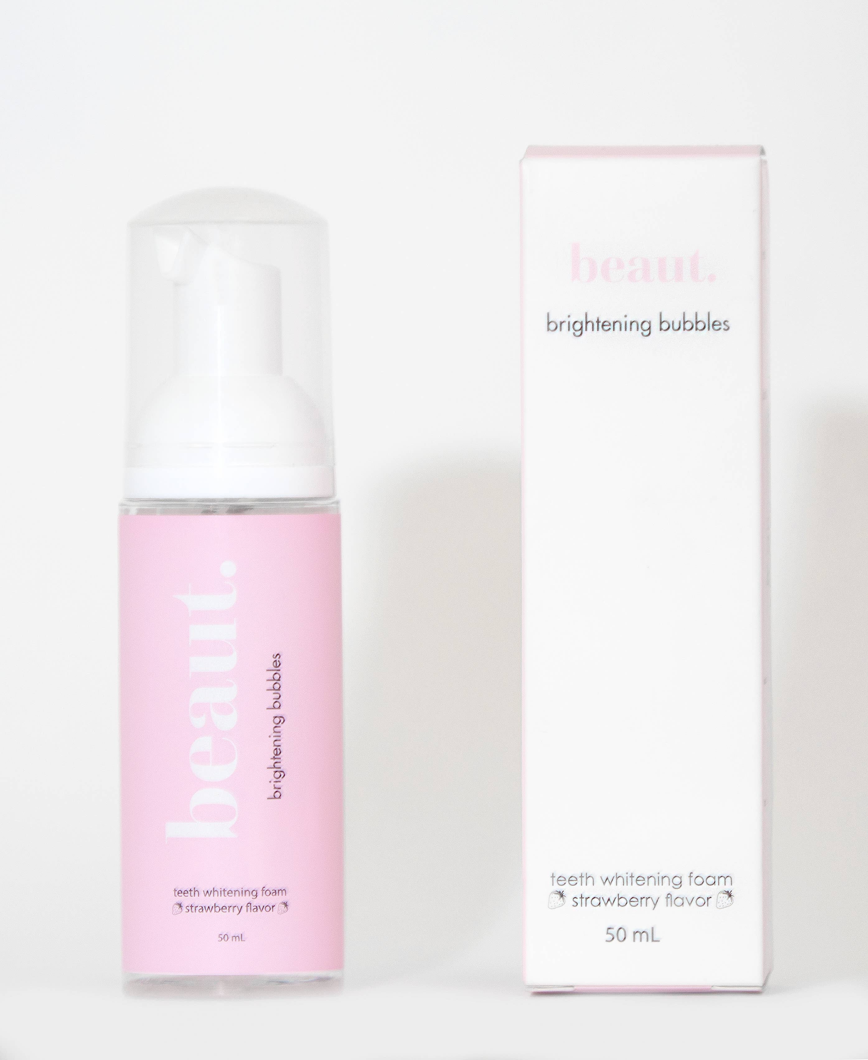 Brightening Bubbles in a pink pump dispenser, featuring strawberry flavor for teeth whitening and daily oral care.