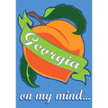 Colorful flag featuring a peach design with a green ribbon and the text 'Georgia on my mind...' against a blue background.