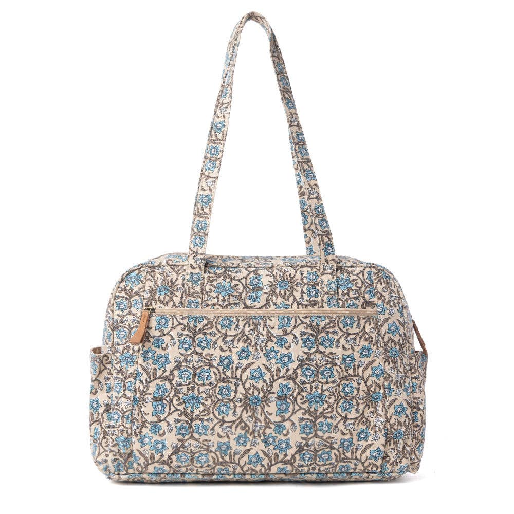Vintage floral diaper bag in dusty teal with spacious design, long handles, and front pocket for easy organization.