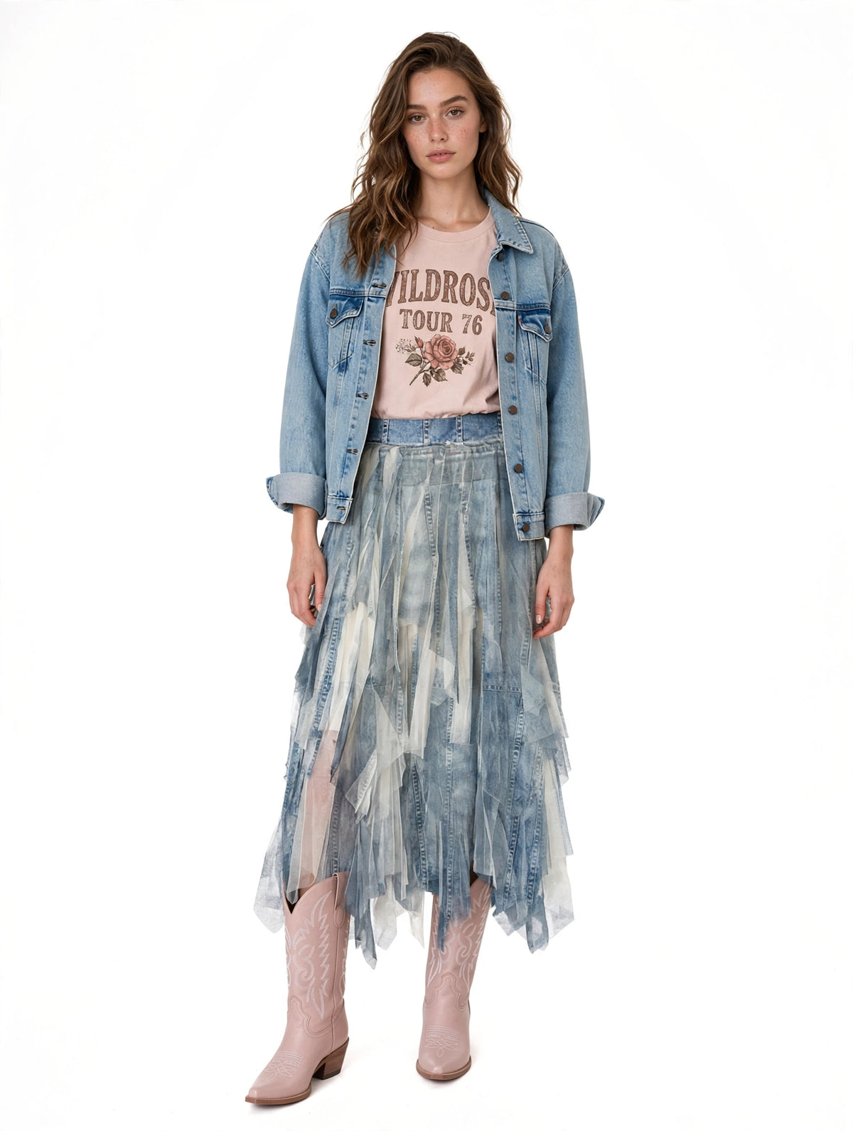 Layered float hem skirt styled with a denim jacket and graphic tee, showcasing a casual yet feminine look.