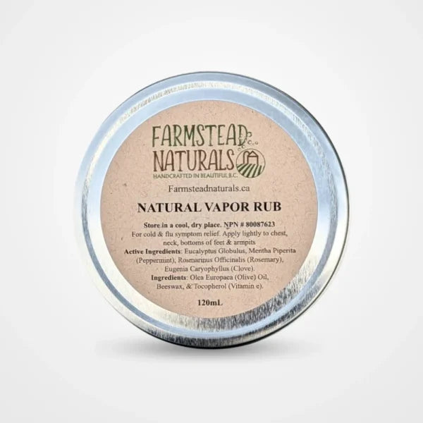 Round tin of Farmstead Naturals Natural Vapor Rub featuring eucalyptus and peppermint, designed for soothing relief.