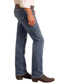 Slim straight fit jeans in medium wash with visible stitching details, designed for comfort and flexibility.