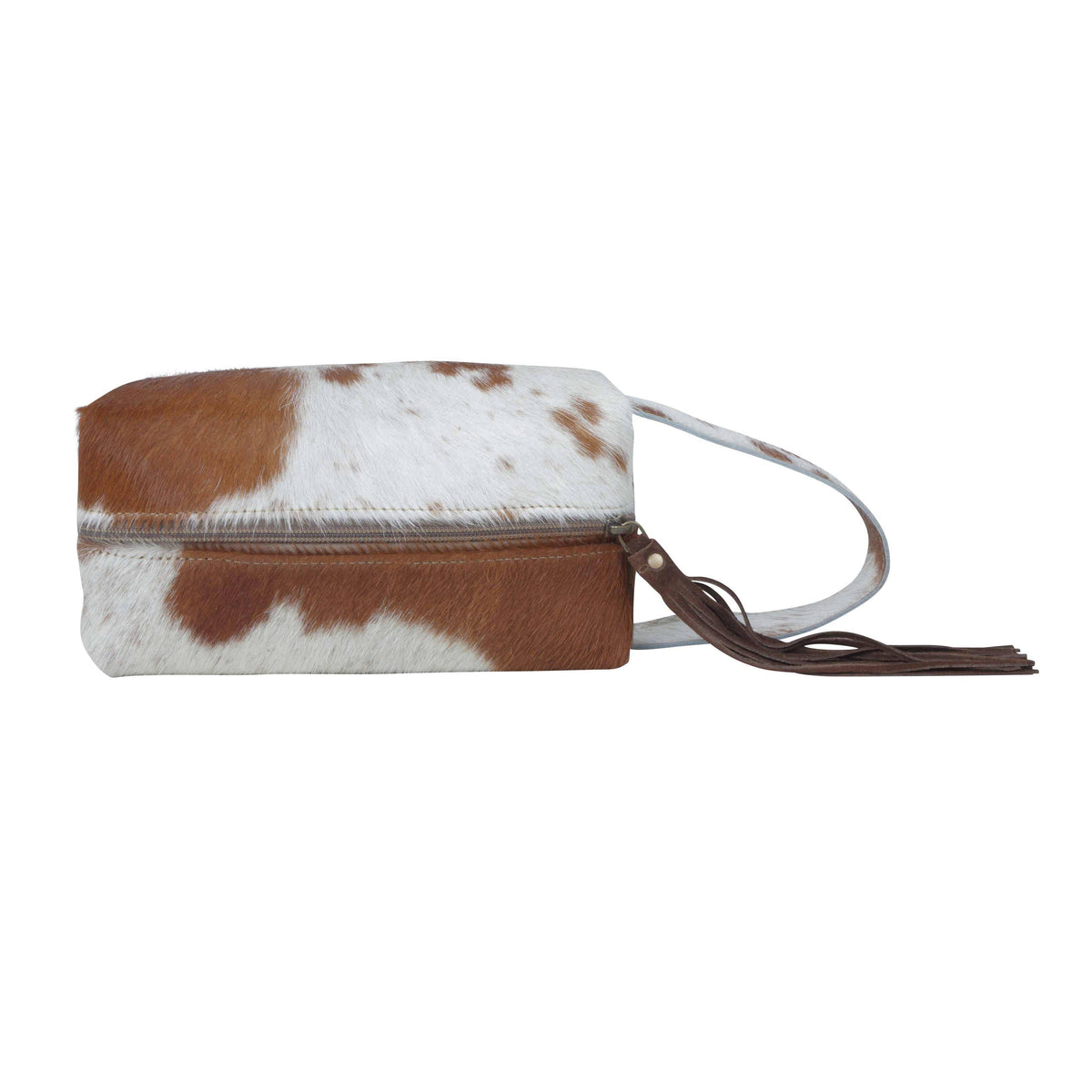 Rectangular Wistful Skies Shaving Kit with a hair-on hide exterior, leather handle, and fringe zipper pull.