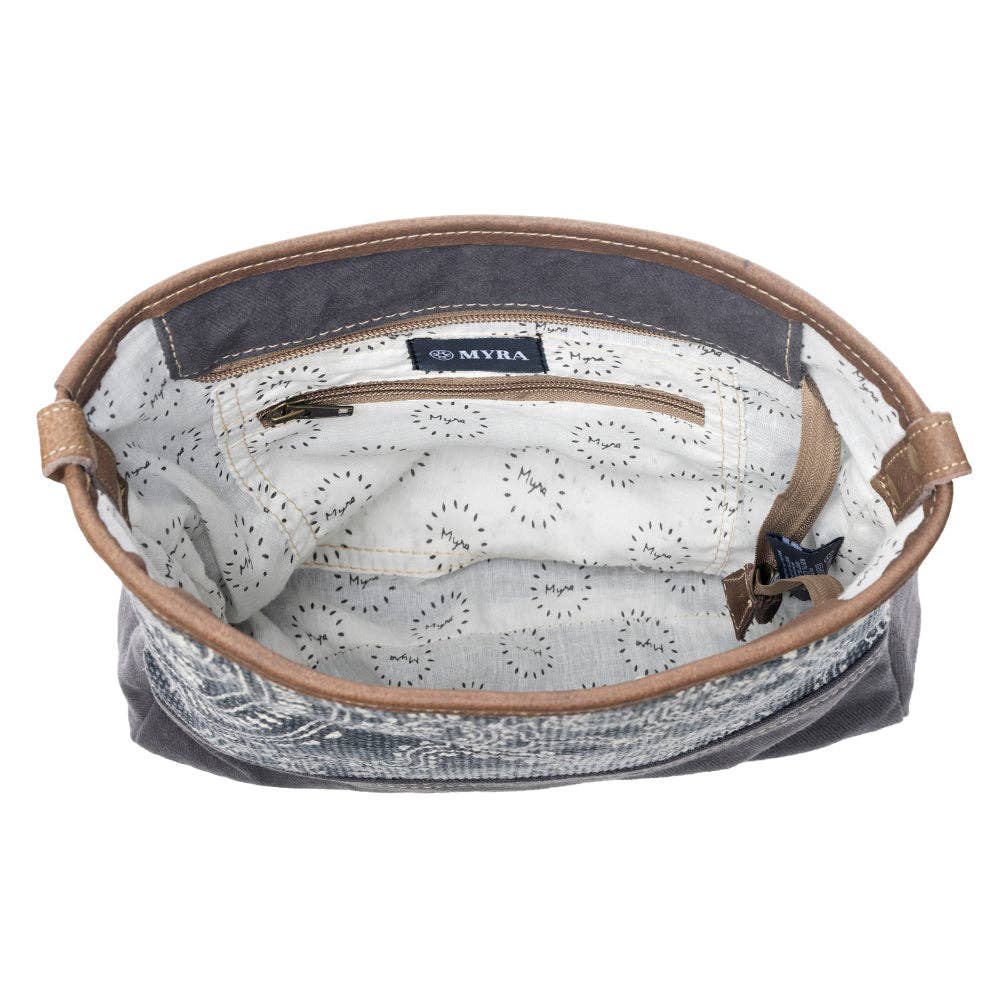 Navy kilim shoulder bag with leather strap, spacious interior, and zipper pocket for stylish travel and daily use.